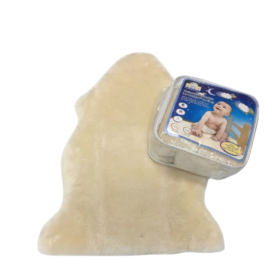 A beige Australian sheepskin baby rug with a product label indicating it is made for baby's comfort and play.