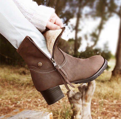 Person in brown boots standing on log in forest - bonnienu buckchoclse Koalabi Boots - Koalabi Australia